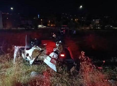 Bursa'da kontrolden çıkan otomobil araziye savrulup takla attı